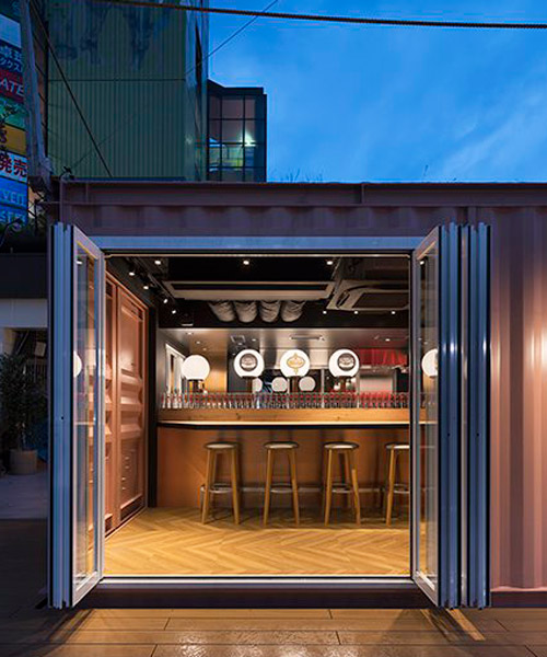 I IN repurposes a shipping container to form the SCHMATZ beer stand in tokyo