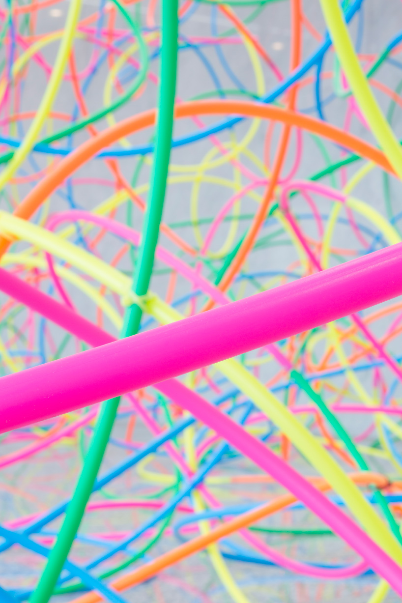 kengo kito uses hula-hoops and other colorful objects to create playful compositions