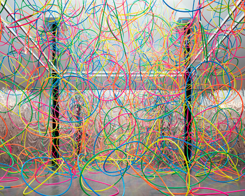kengo kito uses hula-hoops and other colorful objects to create playful compositions