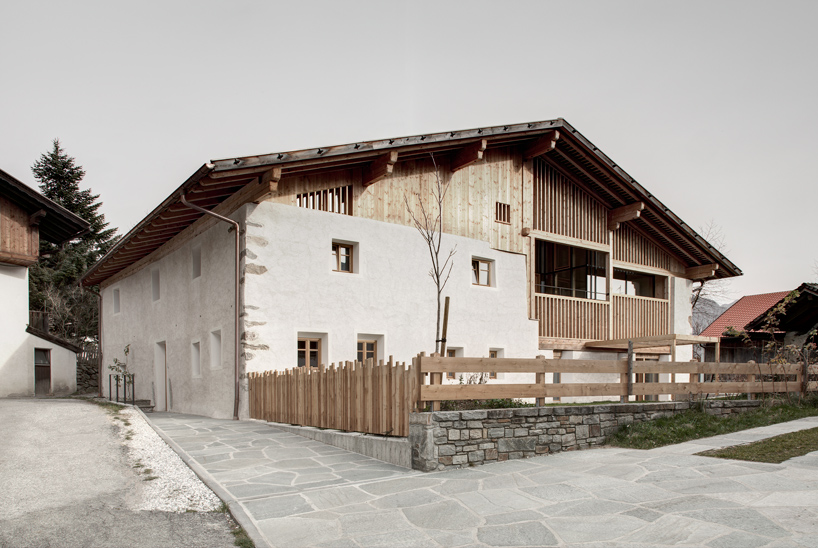 KUP architekten revitalizes traditional tyrolean farmhouse in southern italy