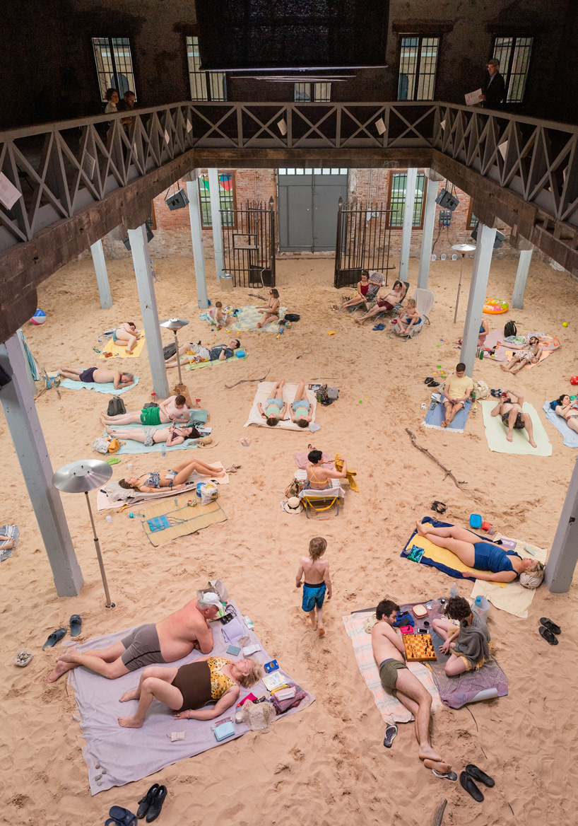 artificially lit beach addresses pressing ecological issues in the lithuanian pavilion
