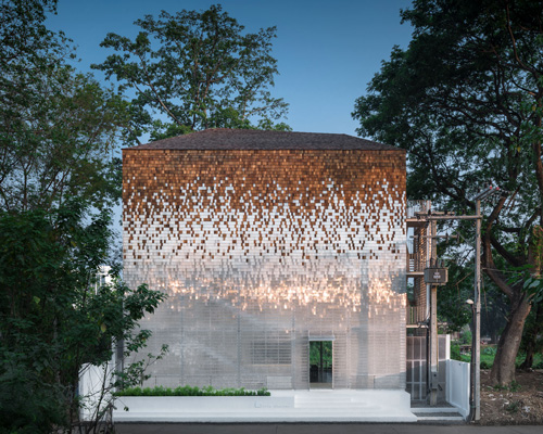 department of architecture adds shimmering façade to little shelter hotel in thailand