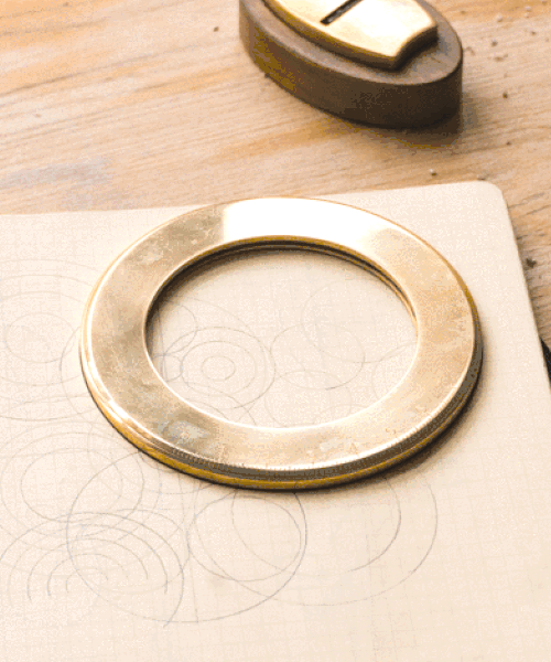 'makers cabinet' updates 18th century drawing compass using camera aperture mechanism