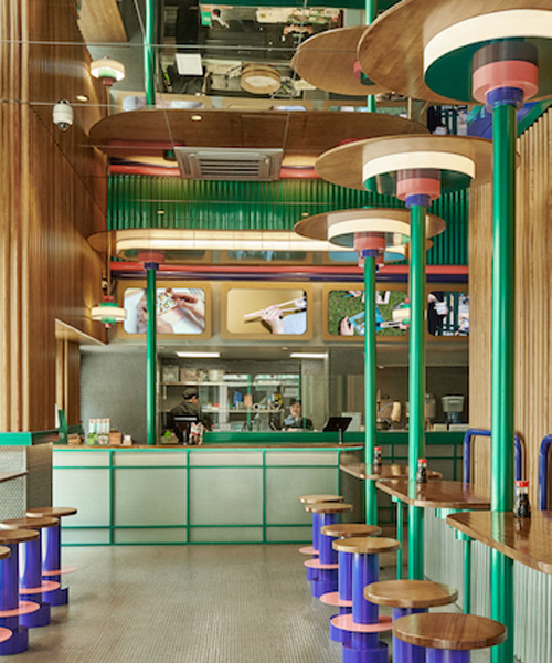 seaweed green and bamboo-esque walls clad masquespacio’s newest kento restaurant in spain