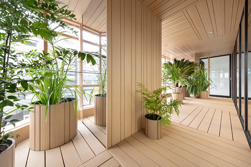 nendo's timber-grid tokyo building tops out with a sky forest terrace