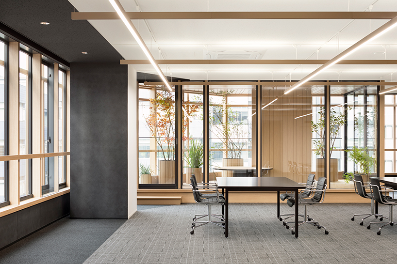 nendo's timber-grid tokyo building tops out with a sky forest terrace