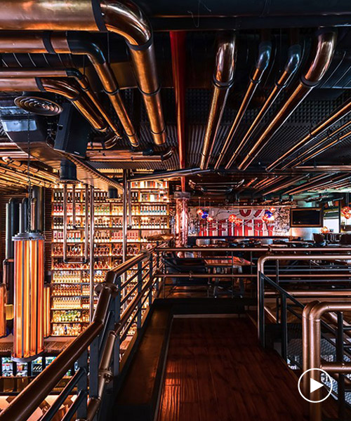 nexus uses copper pipes to adorn the bar interior of 'refinery 091' in india