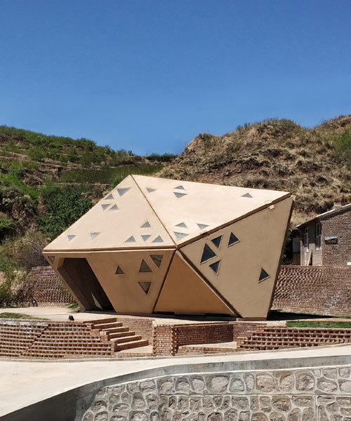 this village hut in china opens and closes in response to the region's weather