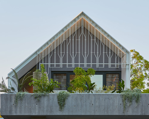 CAPA builds narrow residence with patterned brickwork and stone in australia