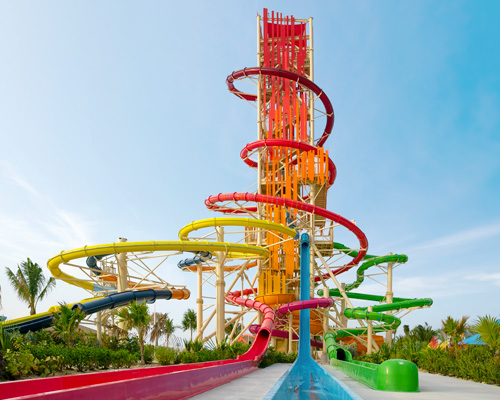 private island waterpark features colorfully clad 135-foot-tall waterslide