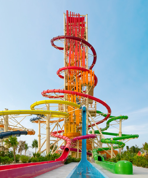 private island waterpark features colorfully clad 135-foot-tall waterslide