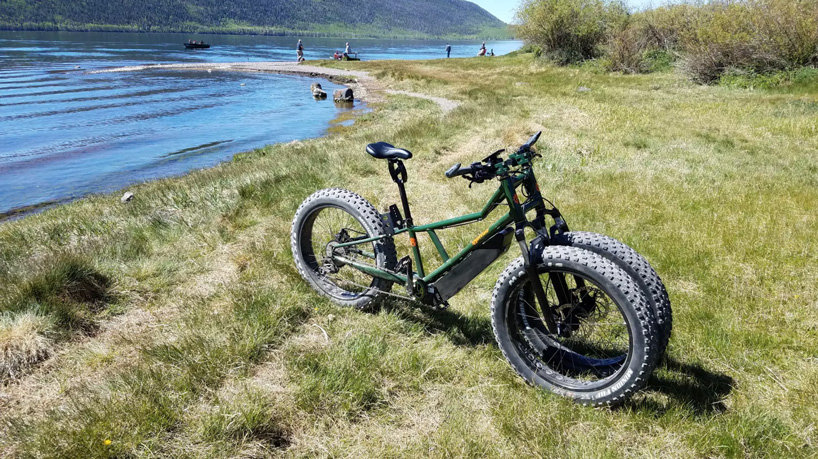 rungu s three wheeled fat bike floats over sand and snow