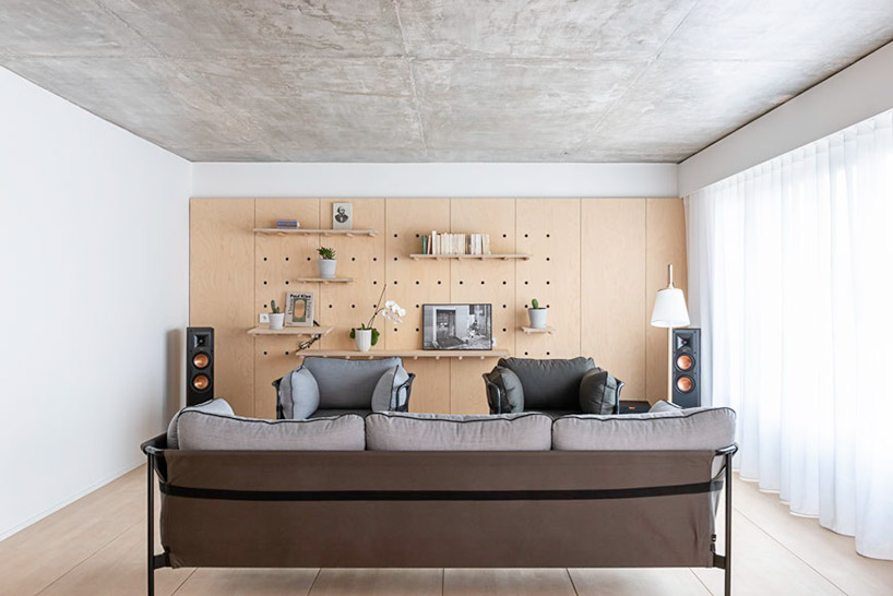 SABO carves a cat door into duplex apartment renovation in paris designboom