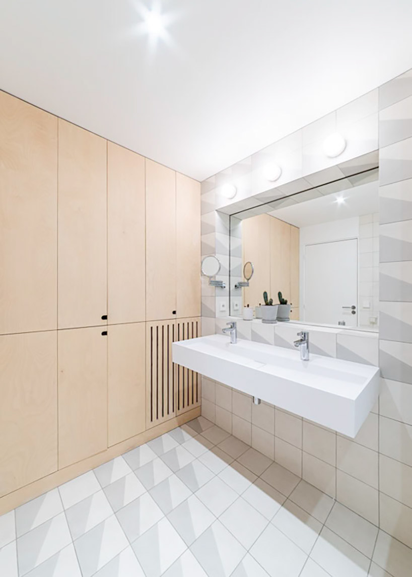 SABO carves a cat door into duplex apartment renovation in paris designboom