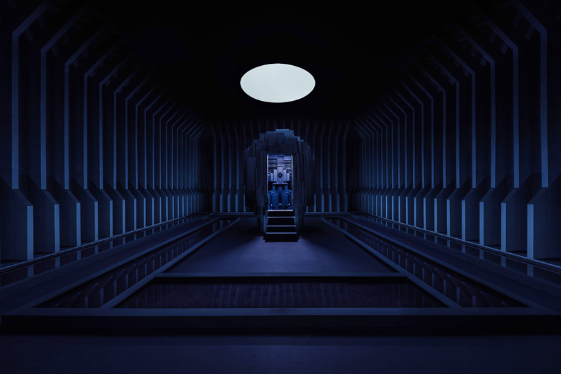 a mysterious blue glow peaks from a passage in this sanctuary within a ...