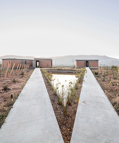santos bolivar architects scatters rammed-earth hotel across mexican landscape