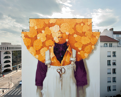 skin speckled with stars, eyes blinded with flowers: a mural by chilean artist inti