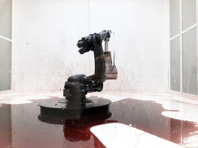 industrial robot continuously sweeps blood-like fluid in sun yuan