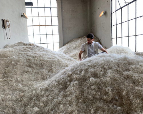 wish-processing center with fluffy piles of dandelions takes over industrial site in LA