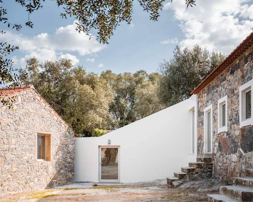 phyd arquitectura connects stone ruins to create contemporary house in portugal
