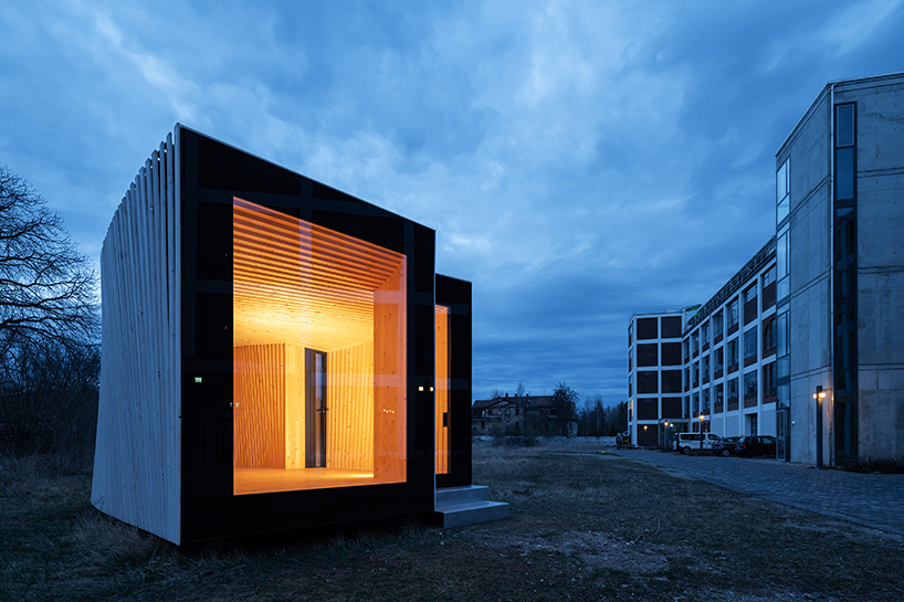 the IBA timber prototype house is a ‘log cabin turned on its side’