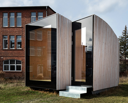 the IBA timber prototype house is a 'log cabin turned on its side'