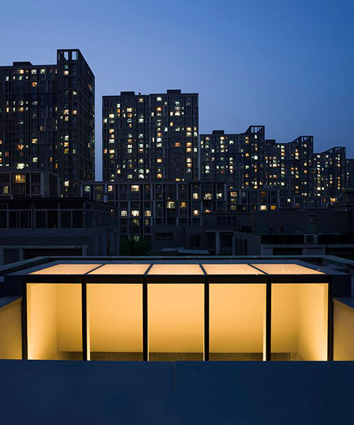 glass box illuminates artist's residence in beijing by atelier about architecture