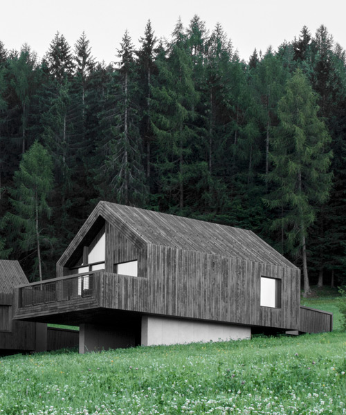 bergmeisterwolf elevates three 'forest houses' at the foot of an italian woodland