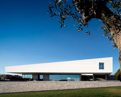 bica arquitectos tops residence with long white volume in western portugal