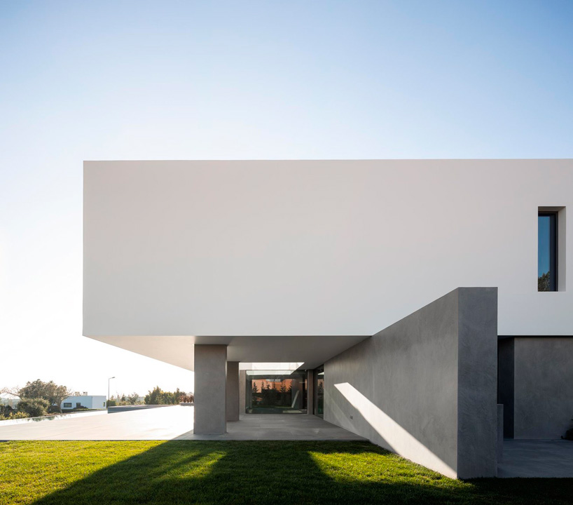 bica arquitectos tops residence with long white volume in western portugal