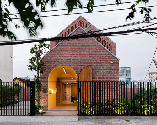 block architects encloses three-part house in vietnam with patterned brick shell