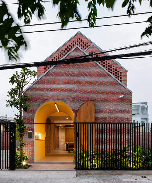 block architects encloses three-part house in vietnam with patterned brick shell
