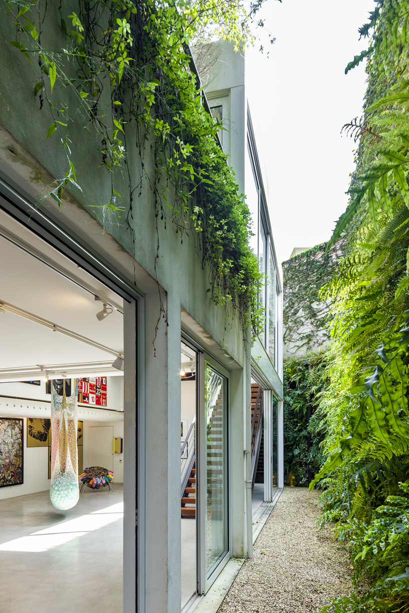 BZP arquitetura creates a light-filled art gallery space in a são paulo garden designboom