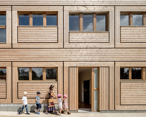 eduard balcells turns spanish kindergarten’s facade into inhabitable alcoves