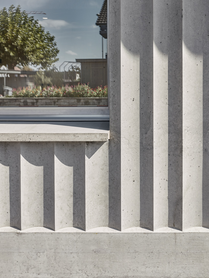 estrada reichen + malte k combine kindergarten with an underground car park in switzerland