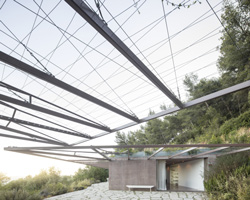 extrastudio embeds 'twin houses' into the terrain of southern portugal