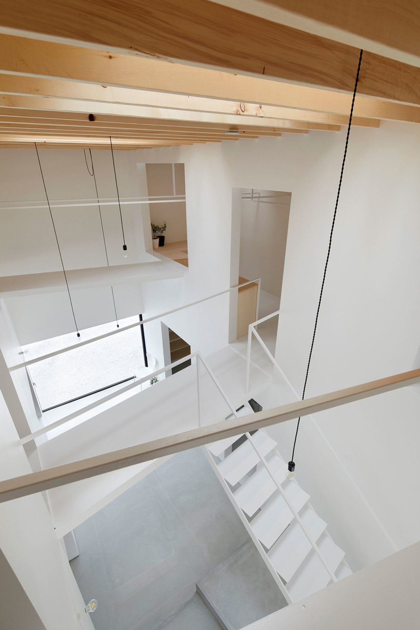 atelier kenta eto wraps cube house in black aluminum in kadokawa, japan