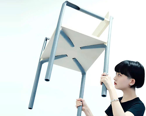 kentaro takagi bends recycled PVC tubes into contemporary chair