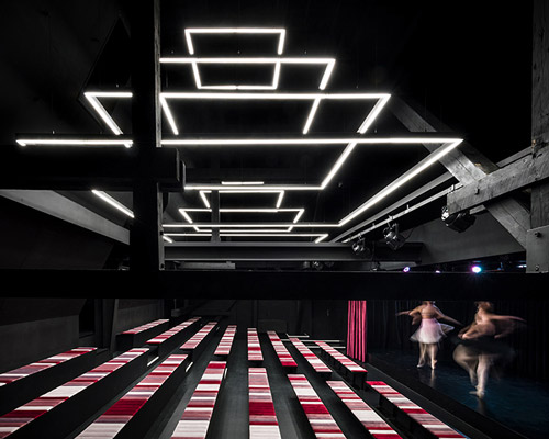 light pyramids adorn black box theater in slovenia by kosi in partnerji