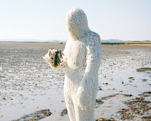 laura thompson's photoseries captures yeti-like creatures made from manmade plastic