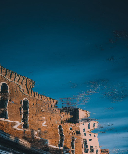 a reflected world of venice is captured in mayank thammalla's latest photo series