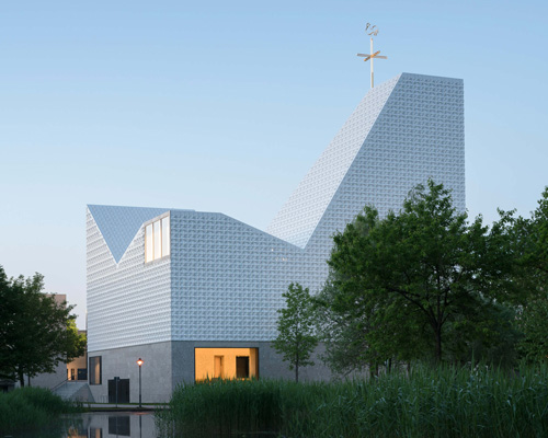 meck architekten wraps sculptural munich church in white ceramic tiles