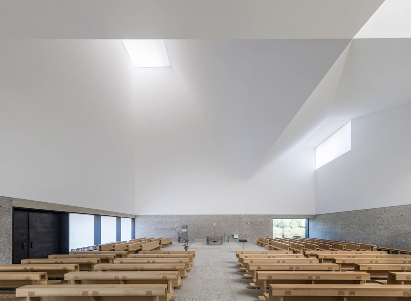 meck architekten wraps sculptural munich church in white ceramic tiles