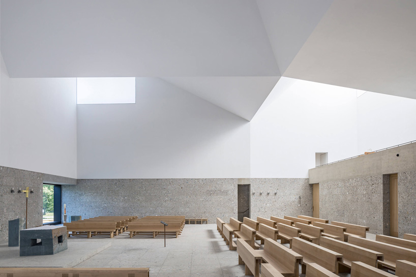 meck architekten wraps sculptural munich church in white ceramic tiles