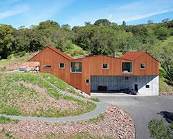 the triple barn house reflects the rural landscape of california's sweeping sonoma valley