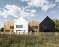NZI architectes uses wood and straw to fabricate social housing in france
