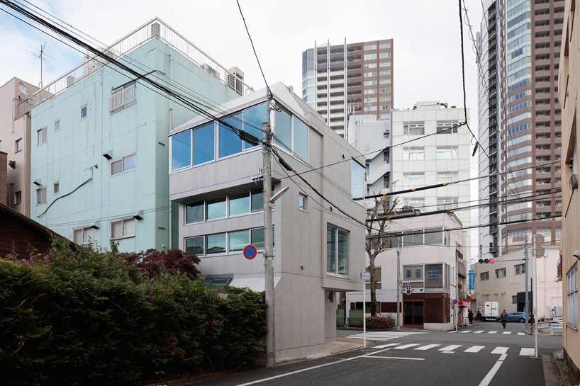 ondesign partners builds compact urban cabin with concrete and wood in tokyo