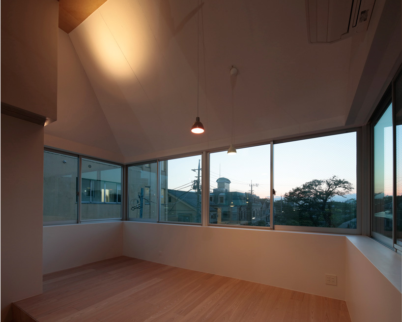 ondesign partners builds compact urban cabin with concrete and wood in tokyo