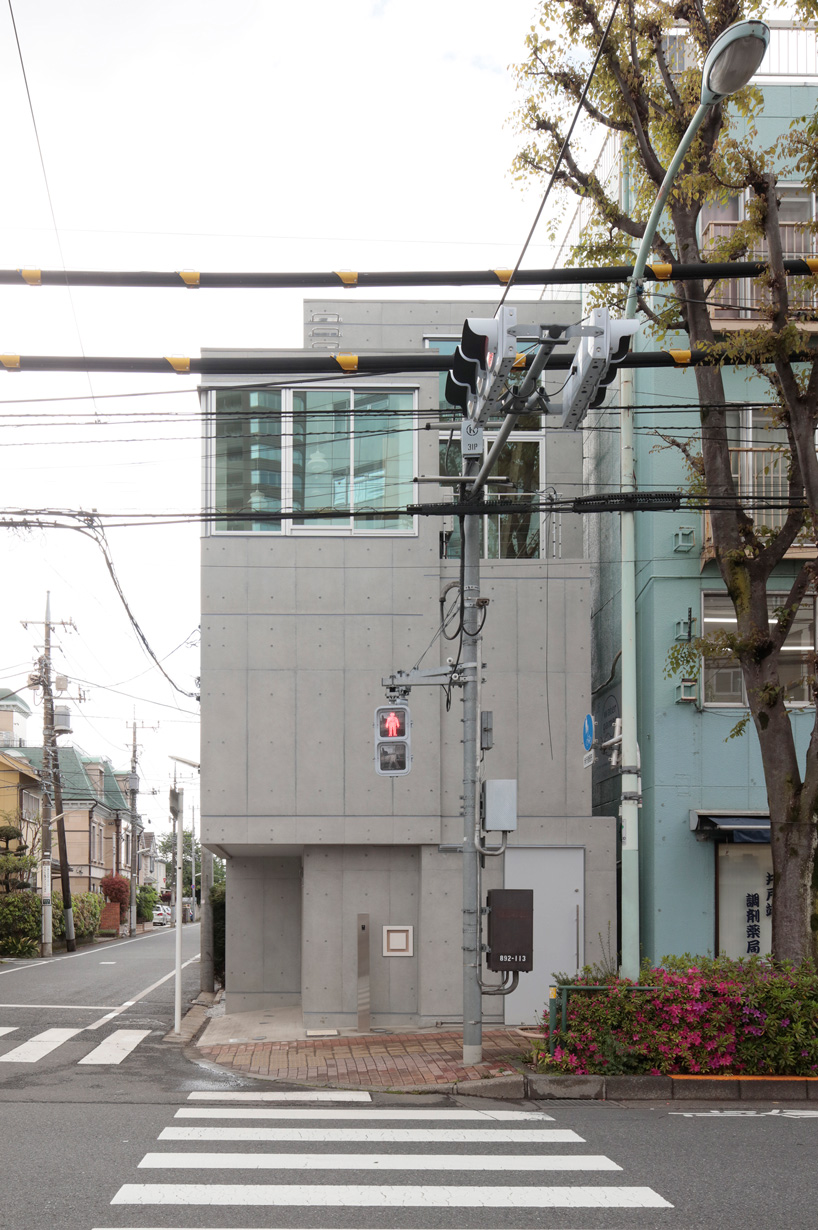 ondesign partners builds compact urban cabin with concrete and wood in tokyo