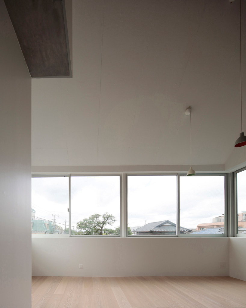 ondesign partners builds compact urban cabin with concrete and wood in tokyo